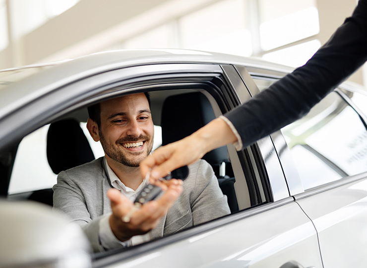 Happy man after renting a car form goldenlease